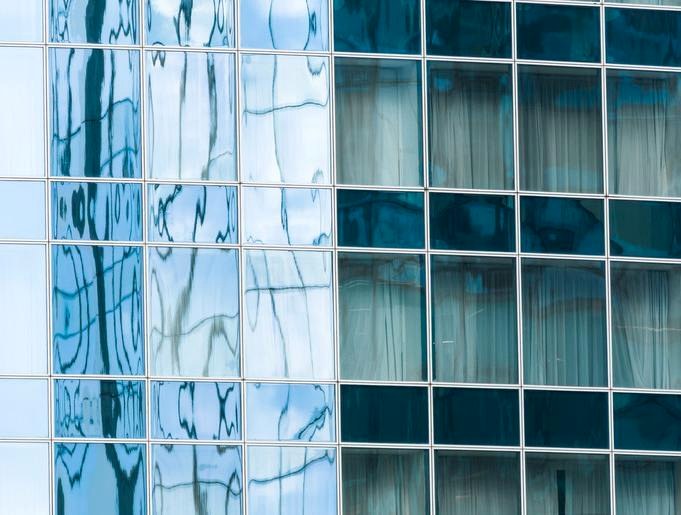 Glass curtain wall facade for exterior sealant applications